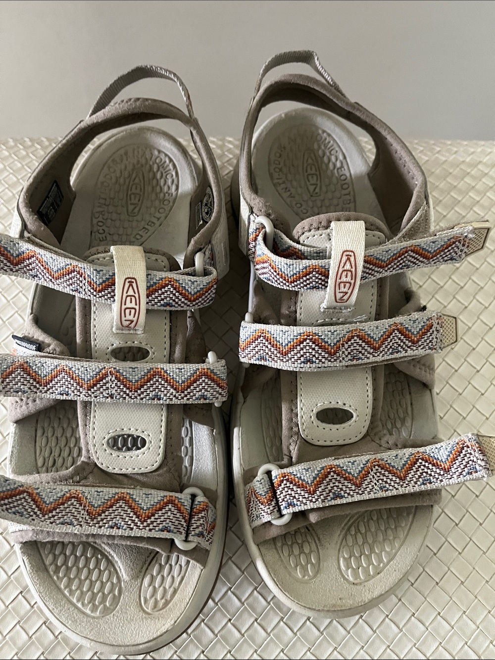 KEEN Woman’s Beige Sandals with Orange & Brown Patterned Straps